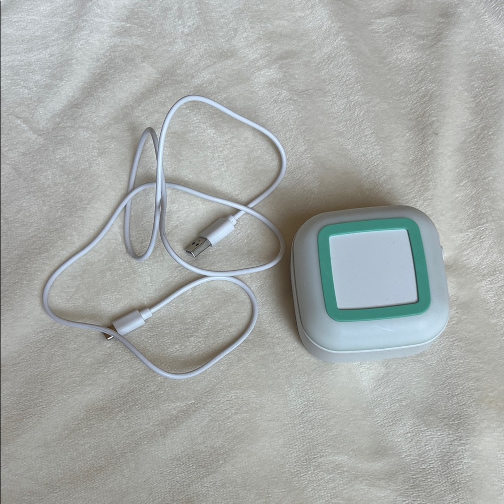 Frida baby sound machine with charging cord